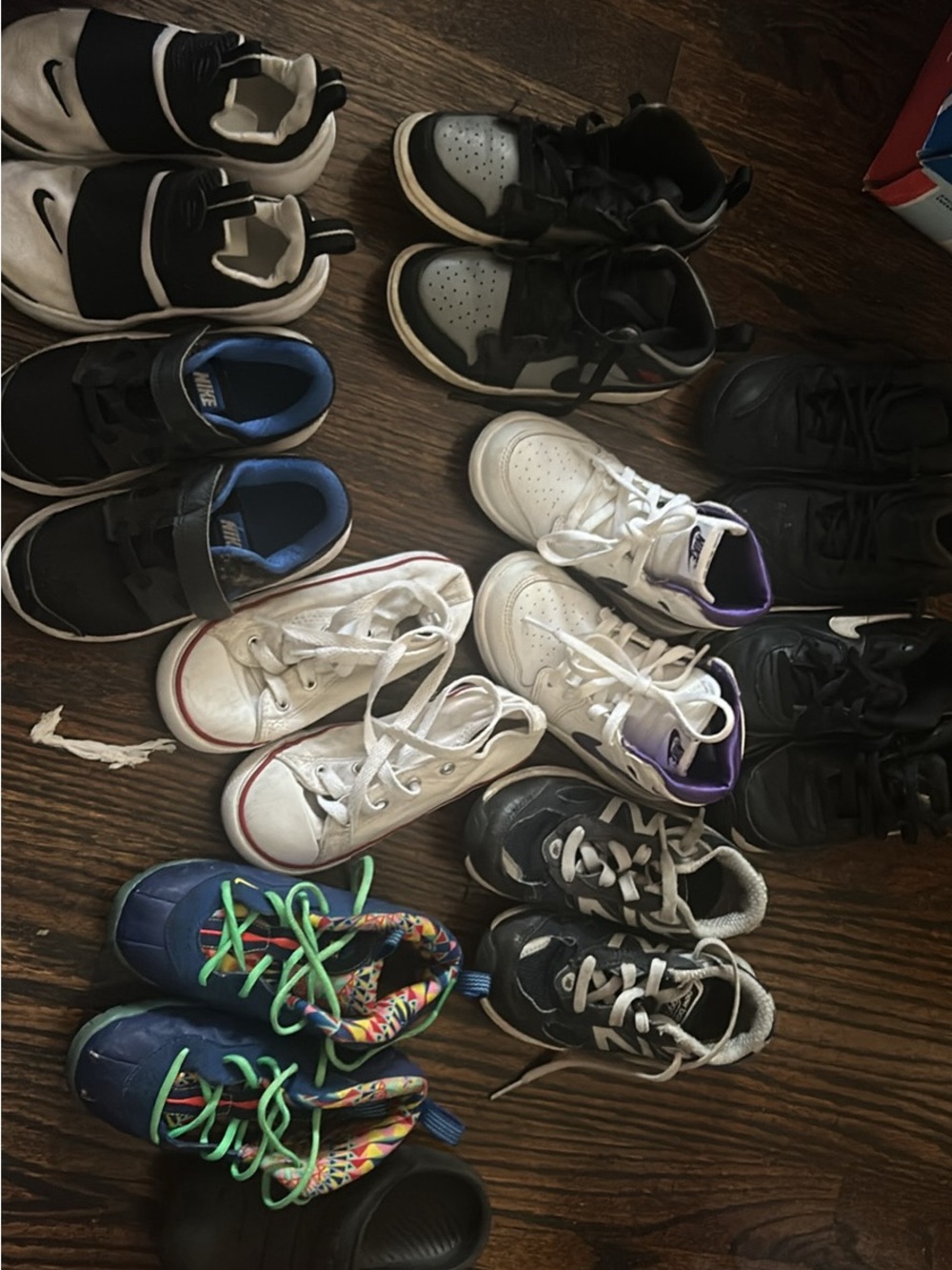 Nike Kids White Sneakers with Purple Collar Accent